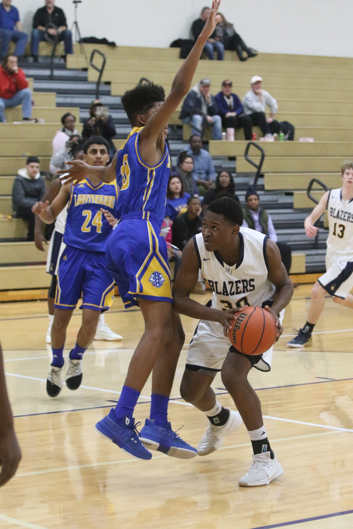 Gallery: Lighthouse at Marquette Catholic boys basketball